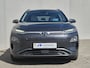 Hyundai Kona Electric EV Premium 64 kWh / SOH 100% / Dealer onderhouden / Head Up Display / CCS snelladen / Stuur- & Stoelverwarming / Warmtepomp / Achteruitrijcamera / Adaptief cruise control / Keyless Entry/Start / Apple Carplay Android Auto /