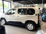 Peugeot Rifter 110 Pk Benzine * GT-Line * Super Netjes * Navigatie * Panoramadak * Trekhaak *  Stoelverwarming * Keyless Entry & Start *  Climate & Cruise Control * L.M. Velgen * Vingerhoets; Vierde Generatie Eersteklas Service. Al meer dan 100 jaar een begrip in de Brabantse Kempen.