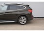 BMW X1 SDrive18i Centennial High Executive | Pano | H&K | Elektr Stoel | Camera |