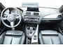 BMW 1-Serie M140i xDrive High Executive * Schuifdak * M-Performance Uitlaat * Harman/Kardon * M-Sportremmen *