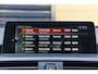 BMW 1-Serie M140i xDrive High Executive * Schuifdak * M-Performance Uitlaat * Harman/Kardon * M-Sportremmen *