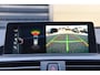 BMW 1-Serie M140i xDrive High Executive * Schuifdak * M-Performance Uitlaat * Harman/Kardon * M-Sportremmen *