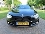 BMW 1-Serie 116i EDE High Executive Sport Leer Sportstoelen Stoelverwarming Ecc Cruisecontrol Carplay Navigatie Xenon Pdc LM Velgen