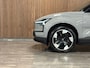 Volvo EX30 Single Motor Extended Range Plus 69 kWh | Trekhaak | Stoel en Stuurwielverwarming | Adaptieve Cruise Control | Harman Kardon | Parkeercamera | Pilot Assist | BLIS Dode Hoek Detectie | 19 Inch | Keyless Drive | Parkeersensoren voor+achter | Google Infotainment | Elektrisch bedienbare achterklep | Extra getint glas achter | Electronic Climate Control 2-Zone | Indigo - Textiel / Nordico bekleding | Warmtepomp | DAB Radio | Apple Carplay/Android auto | Volvo On Call met mobiele App functie | Vapour Grey Metallic |