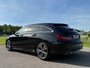Mercedes-Benz CLA Shooting Brake 180d Business Solution AMG / Harman-Kardon / Leder / Camera / Navi / 18" Velgen / Clima /