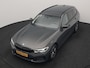 BMW 3-Serie Touring 330e Sport Line PHEV 293pk Dealer O.H. DRAVITGRAU | Trekhaak Af Fabriek | Adaptive Cruise | 360 Camera | Lederen Sportstoelen Memory & Verwarmd | Sfeerverlichting | Stuur Verwarmd | Apple Carplay | Navigatie | DAB | Plug In Hybrid |