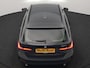BMW 3-Serie Touring 330e Sport Line PHEV 293pk Dealer O.H. DRAVITGRAU | Trekhaak Af Fabriek | Adaptive Cruise | 360 Camera | Lederen Sportstoelen Memory & Verwarmd | Sfeerverlichting | Stuur Verwarmd | Apple Carplay | Navigatie | DAB | Plug In Hybrid |