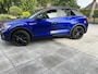 Volkswagen T-Roc 1.5 TSI DSG R-LINE EDITION , BLACK STYLE , AFN TREKHAAK , IQ-LIGHT , LED , KEYLESS ENTRY , ADAPTIVE CRUISE , LANE ASSIST , COCKPIT PRO , TWO TONE , STUUR EN STOELVERWARMING , PRIVACY GLASS , APPEL CARPLAY / ANDROID , ACHTERKLEP MET VOETSENSOR , SIDE ASSI