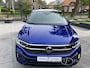 Volkswagen T-Roc 1.5 TSI DSG R-LINE EDITION , BLACK STYLE , AFN TREKHAAK , IQ-LIGHT , LED , KEYLESS ENTRY , ADAPTIVE CRUISE , LANE ASSIST , COCKPIT PRO , TWO TONE , STUUR EN STOELVERWARMING , PRIVACY GLASS , APPEL CARPLAY / ANDROID , ACHTERKLEP MET VOETSENSOR , SIDE ASSI
