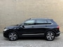 Volkswagen Tiguan 1.4 TSI eHybrid 245pk Elegance | Panoramadak | Trekhaak wegklapbaar | Adaptieve cruise | Lane assist | Camera | Virtueel cockpit | Stoel&stuurverwarming | Matrix-LED | DAB | Apple CarPlay / Android Auto | Navigatie | Volledig onderhouden