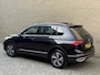 Volkswagen Tiguan 1.4 TSI eHybrid 245pk Elegance | Panoramadak | Trekhaak wegklapbaar | Adaptieve cruise | Lane assist | Camera | Virtueel cockpit | Stoel&stuurverwarming | Matrix-LED | DAB | Apple CarPlay / Android Auto | Navigatie | Volledig onderhouden