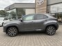 Toyota Yaris Cross HYBRID 115 FIRST EDITION PARK-SENSOREN STOEL/STUURVERWARMING 17" LM-VELGEN ALL-SEASONS KEYLESS