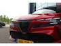 Alfa Romeo Junior ELETTRICA SPECIALE 156PK 54 kWh | PANORAMISCH SCHUIF/KANTEL DAK | BICOLOR DAK (ZWART DAK) | WARMTEPOMP | TECHNOLOGIE PAKKET (O.A. FULL LED ADAPTIVE MATRIX KOPLAMPEN/DODEHOEK DETECTIE/DRAADLOZE TELEFOONLADER/ACHTERUITRIJ CAMERA/PARKEERSENSOREN VOOR, ACHTER,ZIJKANT) | DRAADLOZE APPLE CARPLAY/ANDROID AUTO | CLIMATE CONTROL | ELEKTRISCH BEDIENBARE ACHTERKLEP | STOEL VERWARMING | ELEKTRISCH BEDIENBARE VOORSTOEL MET MASSAGE FUNCTIE | VERKEERSBORDEN HERKENNING | ADAPTIVE CRUISE CONTROL | KEYLESS ENTRY/START | VOORRUIT VERWARMING |
