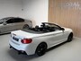 BMW 2-Serie Cabrio M235i - AUTOMAAT - PARELMOER WIT - LEER - NAVIGATIE - HARMAN KARDON - M PERFORMANCE UITLAAT