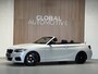 BMW 2-Serie Cabrio M235i - AUTOMAAT - PARELMOER WIT - LEER - NAVIGATIE - HARMAN KARDON - M PERFORMANCE UITLAAT