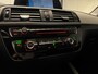 BMW 1-Serie 118i Corporate Lease Executive (CRUISE, NAVI, STOELVERWARMIING, PARKEERSENSOREN, GOED ONDERHOUDEN)