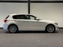 BMW 1-Serie 118i Corporate Lease Executive (CRUISE, NAVI, STOELVERWARMIING, PARKEERSENSOREN, GOED ONDERHOUDEN)