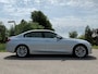 BMW 3-Serie 330e Centennial High Executive Automaat / 1e Eigenaar / Schuifdak / HUD / Sport-Leder / Camera / Navi / Clima / PDC /