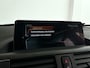 BMW 1-Serie 118i Aut. Corporate Lease High Executive | Schuif-/kanteldak