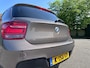 BMW 1-Serie 125i Business+ Automaat*Elektrische schuifdak*Dealer onderhouden*Navigatie*Cruise*Airco*LM velgen*Parkeersensoren*