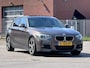BMW 1-Serie 125i Business+ Automaat*Elektrische schuifdak*Dealer onderhouden*Navigatie*Cruise*Airco*LM velgen*Parkeersensoren*