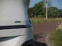 Kia EV6 GT-Line 77.4 kWh | SOH 100% | Panoramadak | Trekhaak | 360 Camera | Head-Up Display | MERIDIAN SURROUND |