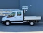 Ford Transit 310 2.0 TDCI 130pk L2H1 DC Trend | Open Laadbak | Trekhaak 2550KG | Airco | Kunstleder | Bluetooth | 7-persoons