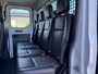 Ford Transit 310 2.0 TDCI 130pk L2H1 DC Trend | Open Laadbak | Trekhaak 2550KG | Airco | Kunstleder | Bluetooth | 7-persoons