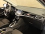 Opel Astra Sports Tourer 1.4 Innovation ORIGINEEL NEDERLANDSE AUTO - AFKOMSTIG VAN 2E EIGENAAR - VASTE TREKHAAK - TREKGEWICHT 1420 KG - SCHUIFDAK - NAVIGATIE - DODEHOEK DETECTIE - KEYLESS ENTRY/ START - PARKEERSENSOREN VOOR/ ACHTER - BEIDE STOELEN IN HOOGTE VERSTELBAAR - ELEKTRISCHE ACHTERKLEP - COMFORTSTOELEN