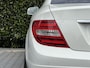 Mercedes-Benz C-klasse Coupé 180 Edition 1 AMG PAKKET, FACELIFT, PANORAMADAK, H/K SOUND, CRUISE CONTROL, CLIMATE CONTROL, STOELVERWARMING, PDC, LICHTMETAAL 19"