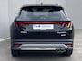 Hyundai Tucson 1.6 T-GDI PHEV Premium Sky 4WD / Fabrieksgarantie tot 09-2029 / Panorama schuifdak / Navigatie / Stoelventilatie / Elektrische stoelen & klep / Stuur-, stoel- & achterbankverwarming / Apple Carplay Android / 19" LM & All Season banden /