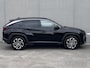 Hyundai Tucson 1.6 T-GDI PHEV Premium Sky 4WD / Fabrieksgarantie tot 09-2029 / Panorama schuifdak / Navigatie / Stoelventilatie / Elektrische stoelen & klep / Stuur-, stoel- & achterbankverwarming / Apple Carplay Android / 19" LM & All Season banden /