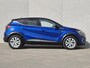 Renault Captur 1.3 TCe 140 Intens / Achteruitrijcamera / Apple Carplay Android Auto / Trekgewicht 1500 kg / Cruise control / Keyless Entry/Start / Draadloze telefoon lader / Navigatie / Parkeersensoren voor en achter / Climate control /