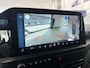 Ford Transit Custom 320 2.5 PHEV L2H1 Limited DC | Dealer onderhouden | Trekhaak | Driver Assistent Pack Ultimate | Dual-zone automatische airconditioning | 17 inch lichtmetalen velgen (Carbonised Grey) | 12V aansluitpunt in laadruimte | 8-weg verstelbare & verwarmbare passagiersstoel