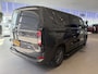 Ford Transit Custom 320 2.5 PHEV L2H1 Limited DC | Dealer onderhouden | Trekhaak | Driver Assistent Pack Ultimate | Dual-zone automatische airconditioning | 17 inch lichtmetalen velgen (Carbonised Grey) | 12V aansluitpunt in laadruimte | 8-weg verstelbare & verwarmbare passagiersstoel
