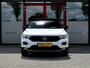 Volkswagen T-Roc 1.5 TSI Sport | Stoelverwarming | Adaptieve Cruise Control | LED Koplampen | Sportstuur | Apple Carplay | Android Auto | Two-Tone Wit - Zwart | Parkeersensoren | Privacy Glas | Sportstoelen | All Season Banden |
