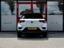 Volkswagen T-Roc 1.5 TSI Sport | Stoelverwarming | Adaptieve Cruise Control | LED Koplampen | Sportstuur | Apple Carplay | Android Auto | Two-Tone Wit - Zwart | Parkeersensoren | Privacy Glas | Sportstoelen | All Season Banden |