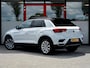 Volkswagen T-Roc 1.5 TSI Sport | Stoelverwarming | Adaptieve Cruise Control | LED Koplampen | Sportstuur | Apple Carplay | Android Auto | Two-Tone Wit - Zwart | Parkeersensoren | Privacy Glas | Sportstoelen | All Season Banden |
