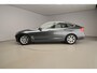 BMW 3-Serie Gran Turismo 320i Automaat / Active Cruise / Trekhaak / Leder / Camera / Head-up / Park assist / Electrische stoelen