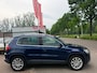 Volkswagen Tiguan 2.0 TSI Sport&Style 4Motion 2e eigenaar dealer onderhouden airco trekhaak parkeer sensor navigatie