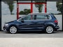 Volkswagen Golf Sportsvan 1.4 TSI Highline | Trekhaak | Camera | Navigatie | Stoelverwarming | Dode Hoek Detectie | Climate Control | Cruise Control | Metallic Lak | All Season Banden | 17'' Lichtmetalen Velgen |