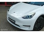 Tesla Model Y RWD 58 kWh | Autopilot 3.0 Ryzen | Stoel en stuurwielverw. | 1e eigenaar | Premium interieur | Pearl White | Spoiler | LFP batterij | SOH 93%