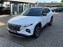Hyundai Tucson 1.6 T-GDI PHEV 265 Pk Comfort 4WD | Bicolor | Navigatie | Camera | Clima | Cruise | Keyless | 19".
