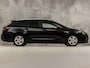 Toyota Corolla 1.8 Hybrid Sport Automaat (NAVIGATIE, LEDER, VIRTUAL COCKPIT, CAMERA, SPORTSTOELEN, GETINT GLAS, ADAPTIVE CRUISE, NIEUWE APK, NIEUWSTAAT)