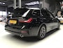 BMW 3-Serie Touring 330e Business Edition Plus I 293PK I Camera I Trekhaak I Ambiente I Full Led I Stoel & Stuurverw. I Half/Leder