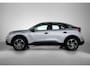 Citroën E-C4 EV You 50 kWh 136pk | Navigatie via Apple Carplay / Android Auto | Achteruitrijcamera | Climate Control | Cruise Control | Parkeersensoren | DAB+ radio | Armsteun | Stof/kunstlederen comfortstoelen | Volledig digitaal instrumentenpaneel | Adaptief demping systeem | 18” lichtmetalen velgen |