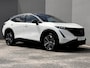 Nissan Ariya Evolve 91 kWh Dealer onderhouden / Accu SoH 99 % / Panorama schuifdak / HUD / Navigatie / Apple Carplay Android / Elektrische stoelen & klep / BOSE / Stoelventilatie / Stoel-, stuur- en achterbankverwarming / 20" LM wielen /