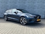Volvo V60 2.0 T6 Plug-in hybrid AWD Ultra Dark | Google | Long Range | Schuif-/Kanteldak | Adaptieve Cruise Control | DAB | Head-Up Display | Camera | Stoelverwarming Voor + Achter | Harman Kardon Audio | Getint Glas | Zitverlenging | Elek. Stoelen | Memory | 19" LM