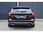 Volvo V60 T6 Plug-in hybrid AWD Ultra Dark | Bowers & Wilkins premium Audio | Massage | Stoel-/Stuurwielverwarming | Head Up Display | 19 inch Lichtmetalen velgen | 360 graden Camera | Panoramisch Schuif-/kanteldak | Lederlook Dashboard | Keyless | Blis | Adaptieve Cruise Control | Pilot Assist |