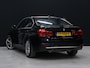 BMW 3-Serie 320i Luxury Edition [CAMERA, PDC, STOELVERWARMING, DIGITAL DASH, CRUISE, BLUETOOTH, NAVIGATIE, LED, MULTIFUNCTIONEEL STUURWIEL, NIEUWSTAAT]